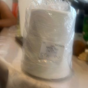 Sell tread white. 100/cotton. 6.00. Dls I have. Boxes.  12000 yardas